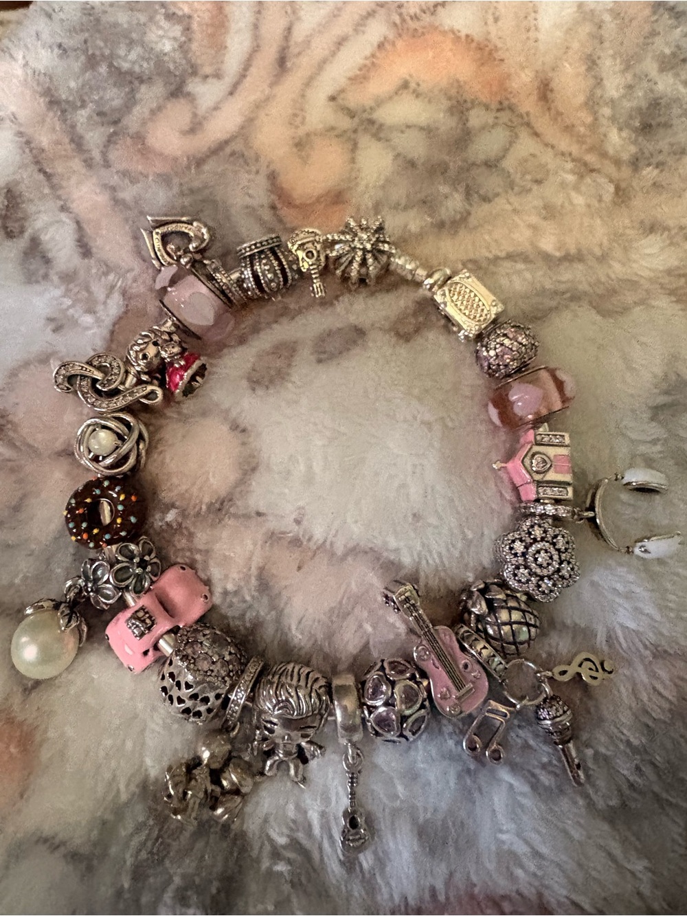 Pandora fireworks clasp bracelet with Pandora and Linx charms